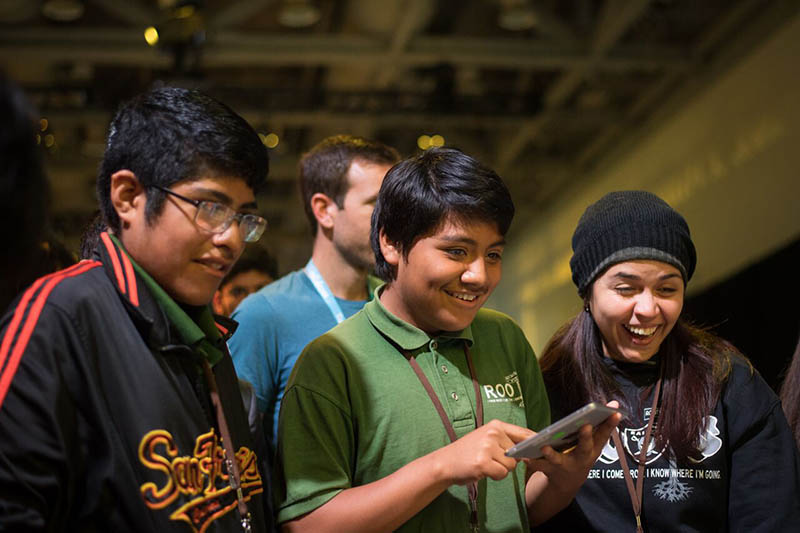 Kids enjoy learning technology skills at a Salesforce event.