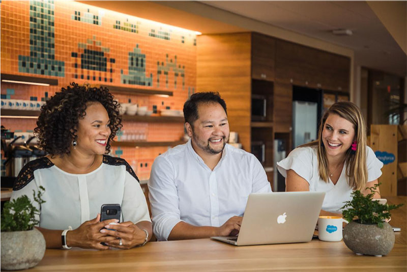 A group of Salesforce employees participating in a meeting