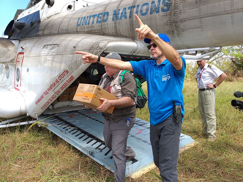World Food Program response team delivering food after a cyclone hit Mozambique.
