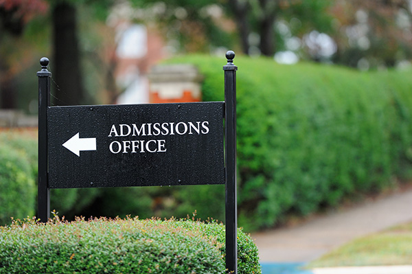 Admissions Office sign on college campus