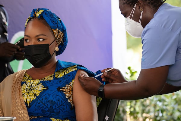 woman getting a vaccination